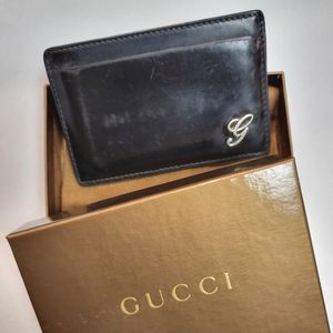 Well loved sleek Gucci card holder